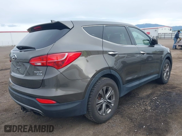 2014 Hyundai Santa Fe z VIN 5XYZTDLB1EG144290, wystawiony jako IAAI lot #42126367 z przebiegiem 138 525 mil mil oraz . Historia ofert i sprzedaży dostępna na DreamBid. Obrazek 4.