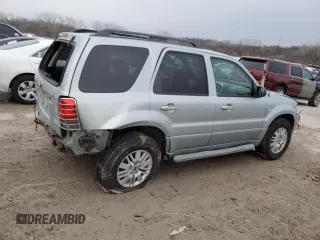 2005 Mercury Mariner Luxury z VIN 4M2CU57105DJ33266, wystawiony jako Copart lot #87002044 z przebiegiem 164 313 mil mil oraz Szkody całkowita. Historia ofert i sprzedaży dostępna na DreamBid. Obrazek 3.