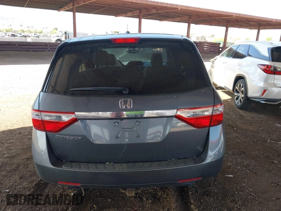 2012 Honda Odyssey EX-L with VIN 5FNRL5H6XCB103498, listed as a IAAI auction lot 42065658 with 104,933 mi miles and . Bid and sale history available at carsss.com. Image 16.