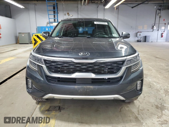 2021 Kia Seltos SX with VIN KNDETCA2XM7167199, listed as a Copart auction lot 52080495 with 82,981 mi miles and Salvage Title. Bid and sale history available at carsss.com. Image 5.