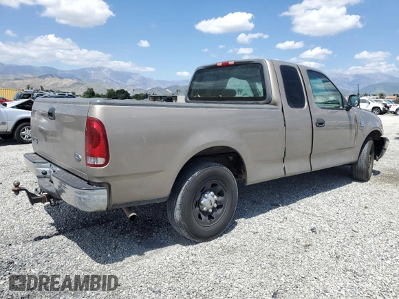 2001 Ford F-150 with VIN 1FTPX17L21NA37619, listed as a Copart auction lot 56922485 with 212,148 mi miles and Salvage title. Bid and sale history available at DreamBid. Image 3.