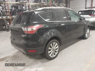 2017 Ford Escape Titanium with VIN 1FMCU9J9XHUB51401, listed as a IAAI auction lot 41025642 with 77,908 mi miles. Bid and sale history available at carsss.com. Image 4.