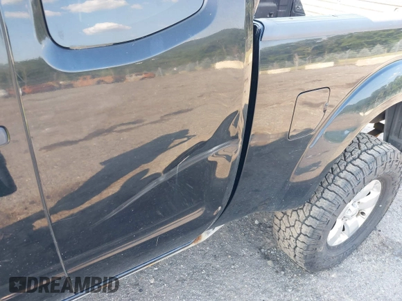 2012 Nissan Frontier SV z VIN 1N6AD0CWXCC452630, wystawiony jako IAAI lot #42819074 z przebiegiem 106 031 mil mil oraz . Historia ofert i sprzedaży dostępna na DreamBid. Obrazek 6.