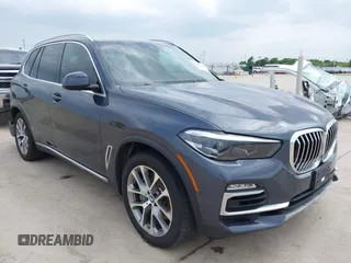 2021 BMW X5 xDrive45e with VIN 5UXTA6C04M9D34382, listed as a IAAI auction lot 42080996 with 24,638 mi miles. Bid and sale history available at carsss.com. Image 1.