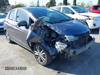 2015 Honda Fit EX-L z VIN 3HGGK5H89FM774299, wystawiony jako IAAI lot #41793448 z przebiegiem 142 228 mil mil oraz . Historia ofert i sprzedaży dostępna na DreamBid. Obrazek 1.