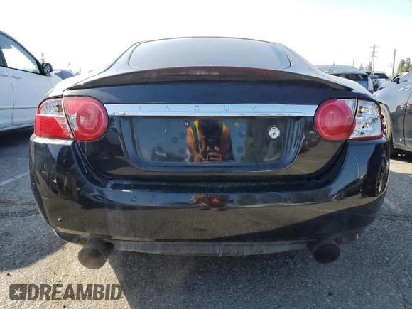 2008 Jaguar XK with VIN SAJWA43B985B23651, listed as a Copart auction lot 54621835 with 145,429 mi miles and Clean Title. Bid and sale history available at DreamBid. Image 6.