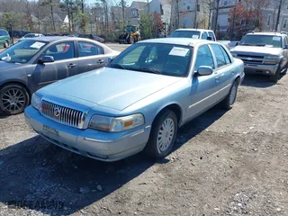 2008 Mercury Grand Marquis LS with VIN 2MEHM75V88X618599, listed as a IAAI auction lot 41698391 with 238,557 mi miles. Bid and sale history available at carsss.com. Image 2.