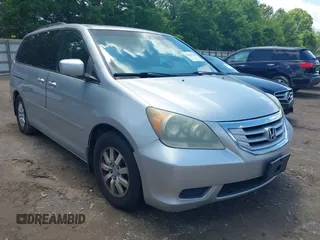 2010 Honda Odyssey EX-L with VIN 5FNRL3H60AB018168, listed as a IAAI auction lot 42241144 with 210,125 mi miles and . Bid and sale history available at DreamBid. Image 1.