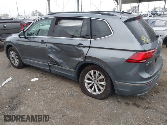2018 Volkswagen Tiguan SEL z VIN 3VV3B7AX4JM005780, wystawiony jako IAAI lot #41880005 z przebiegiem 149 578 mil mil oraz . Historia ofert i sprzedaży dostępna na DreamBid. Obrazek 3.