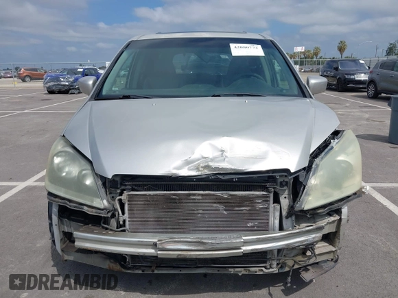 2005 Honda Odyssey EX-L with VIN 5FNRL38745B075486, listed as a IAAI auction lot 42080772 with 197,158 mi miles and . Bid and sale history available at DreamBid. Image 12.