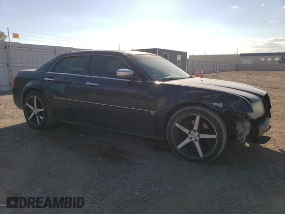 2006 Chrysler 300 C with VIN 2C3KA63H06H272552, listed as a Copart auction lot 72185684 with 105,737 mi miles and Salvage Title. Bid and sale history available at carsss.com. Image 4.