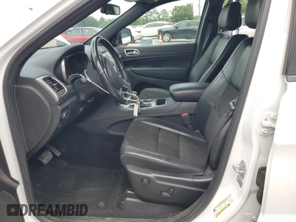 2021 Jeep Grand Cherokee Laredo X with VIN 1C4RJFAG1MC580981, listed as a Copart auction lot 58090225 with 71,942 mi miles and Salvage title. Bid and sale history available at DreamBid. Image 7.
