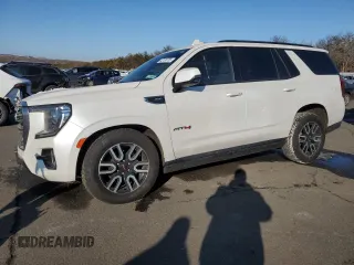 2021 GMC Yukon AT4 with VIN 1GKS2CKD4MR206593, listed as a Copart auction lot 42100765 with 75,930 mi miles and Salvage Title. Bid and sale history available at carsss.com. Image 1.