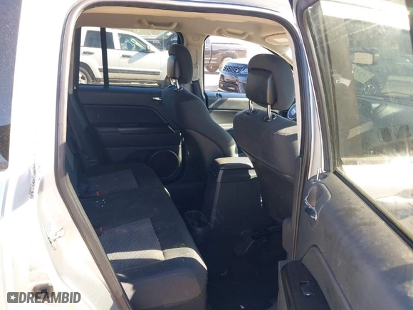 2012 Jeep Compass Latitude with VIN 1C4NJDEB4CD676310, listed as a IAAI auction lot 41714804 with 162,086 mi miles. Bid and sale history available at carsss.com. Image 8.