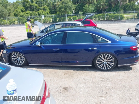 2019 Audi A8 with VIN WAU8DAF82KN017394, listed as a IAAI auction lot 42414936 with 22,482 mi miles and . Bid and sale history available at DreamBid. Image 14.