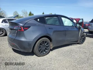 2022 Tesla Model Y Long Range z VIN 7SAYGDEE5NF367885, wystawiony jako Copart lot #52944795 z przebiegiem Nie podano mil oraz Szkoda całkowita • Salvage title. Historia ofert i sprzedaży dostępna na DreamBid. Obrazek 3.