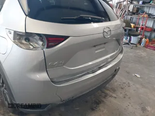 2018 Mazda CX-5 Grand Touring with VIN JM3KFBDM4J0350420, listed as a IAAI auction lot 41881566 with 96,515 mi miles. Bid and sale history available at carsss.com. Image 6.