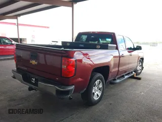 2017 Chevrolet Silverado 1500 LT with VIN 1GCRCRECXHZ241349, listed as a IAAI auction lot 42014523 with 124,703 mi miles and . Bid and sale history available at DreamBid. Image 4.