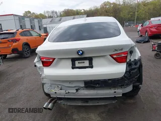 2018 BMW X4 xDrive28i z VIN 5UXXW3C57J0T82081, wystawiony jako IAAI lot #41991254 z przebiegiem 100 654 mil mil oraz . Historia ofert i sprzedaży dostępna na DreamBid. Obrazek 16.