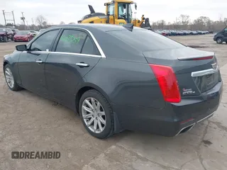 2015 Cadillac CTS AWD z VIN 1G6AW5SX6F0116891, wystawiony jako IAAI lot #42077259 z przebiegiem 119 426 mil mil oraz . Historia ofert i sprzedaży dostępna na DreamBid. Obrazek 3.