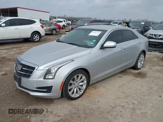 2018 Cadillac ATS RWD z VIN 1G6AA5RX5J0178702, wystawiony jako IAAI lot #41522724 z przebiegiem 79 502 mil mil oraz . Historia ofert i sprzedaży dostępna na DreamBid. Obrazek 17.