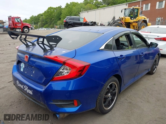 2017 Honda Civic LX with VIN 19XFC2F53HE217867, listed as a IAAI auction lot 42296194 with 104,670 mi miles and . Bid and sale history available at DreamBid. Image 4.