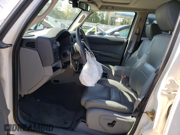 2006 Jeep Commander with VIN 1J8HG48N26C123370, listed as a Copart auction lot 42310645 with 94,985 mi miles and Salvage title. Bid and sale history available at DreamBid. Image 7.
