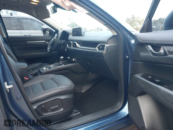 2023 Mazda CX-5 2.5 S Carbon Edition with VIN JM3KFBCM2P0235177, listed as a IAAI auction lot 41209889 with 15,588 mi miles. Bid and sale history available at carsss.com. Image 5.