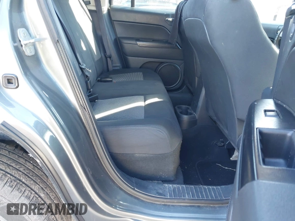 2012 Jeep Patriot Sport with VIN 1C4NJRBB9CD563258, listed as a IAAI auction lot 41249868 with 173,844 mi miles. Bid and sale history available at carsss.com. Image 8.