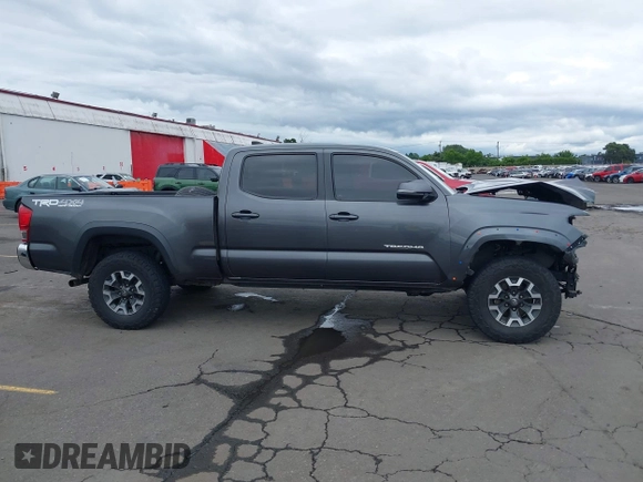 2017 Toyota Tacoma SR5 with VIN 3TMDZ5BN3HM027098, listed as a IAAI auction lot 42409977 with 97,224 mi miles and . Bid and sale history available at DreamBid. Image 14.