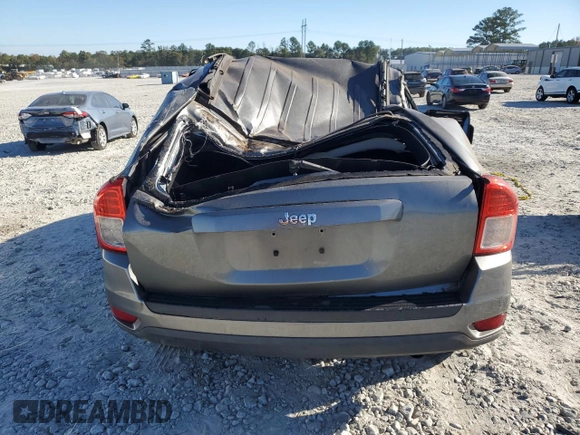 2013 Jeep Compass Sport with VIN 1C4NJCBA1DD131138, listed as a Copart auction lot 73746174 with 118,631 mi miles and Salvage Title. Bid and sale history available at carsss.com. Image 6.