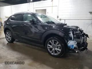 2024 Mazda CX-30 S Premium with VIN 3MVDMBDMXRM674650, listed as a Copart auction lot 54231405 with 7,428 mi miles and Non repairable. Bid and sale history available at DreamBid. Image 4.