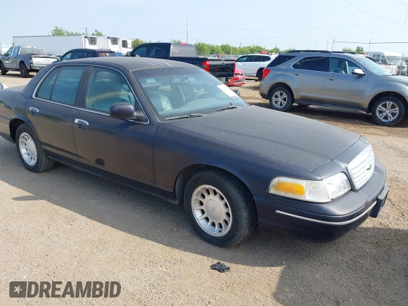 2000 Ford Crown Victoria LX z VIN 2FAFP74W4YX188831, wystawiony jako IAAI lot #41221337 z przebiegiem 169 380 mil mil oraz . Historia ofert i sprzedaży dostępna na DreamBid. Obrazek 1.