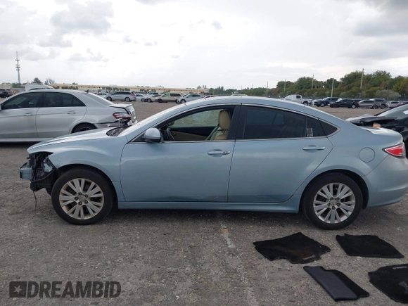 2009 Mazda 6 i Touring with VIN 1YVHP82AX95M19535, listed as a IAAI auction lot 41987285 with 129,111 mi miles and . Bid and sale history available at carsss.com. Image 15.