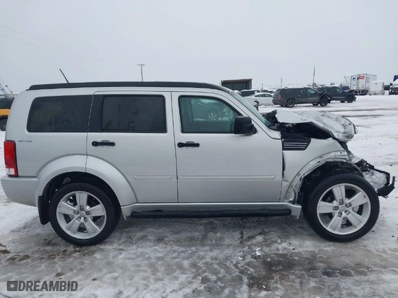 2011 Dodge Nitro Heat with VIN 1D4PU4GX1BW607458, listed as a IAAI auction lot 41279270 with 90,969 mi miles. Bid and sale history available at carsss.com. Image 14.