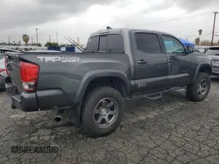2016 Toyota Tacoma SR with VIN 3TMCZ5AN6GM018536, listed as a Copart auction lot 49336645 with 103,298 mi miles and Salvage Title. Bid and sale history available at carsss.com. Image 3.
