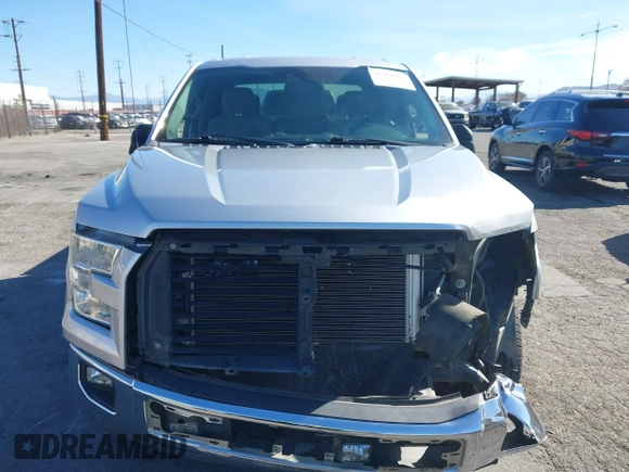 2015 Ford F-150 XLT with VIN 1FTEW1C8XFKE17196, listed as a IAAI auction lot 41414904 with 150,866 mi miles and . Bid and sale history available at carsss.com. Image 12.