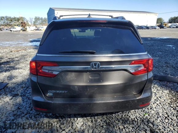 2018 Honda Odyssey EX-L with VIN 5FNRL6H75JB044985, listed as a Copart auction lot 50081345 with 157,688 mi miles and Salvage Title. Bid and sale history available at DreamBid. Image 6.