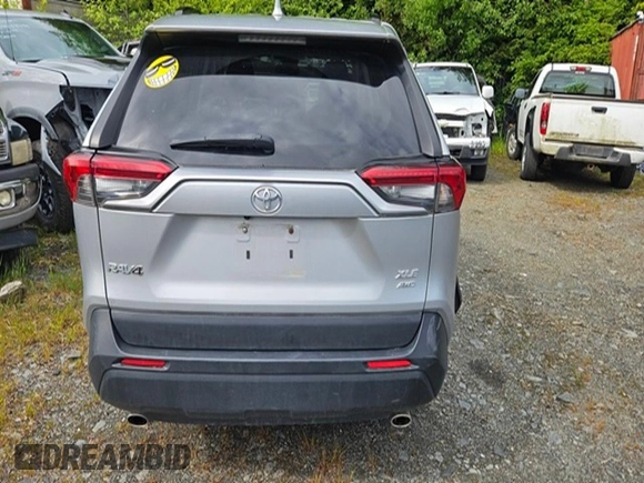 2021 Toyota RAV4 XLE with VIN 2T3P1RFV7MW161787, listed as a Copart auction lot 60937395 with 91,377 mi miles and Salvage title. Bid and sale history available at DreamBid. Image 6.