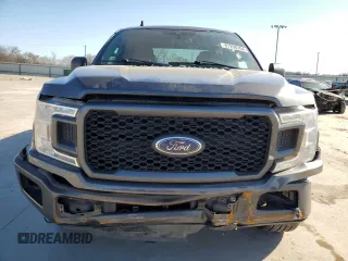 2020 Ford F-150 XL with VIN 1FTEW1CPXLKD42809, listed as a Copart auction lot 87208204 with 104,049 mi miles and Salvage Title. Bid and sale history available at carsss.com. Image 5.