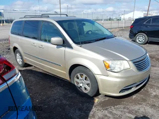 2013 Chrysler Town & Country Touring with VIN 2C4RC1BG9DR519025, listed as a IAAI auction lot 41983781 with 229,772 mi miles. Bid and sale history available at carsss.com. Image 1.