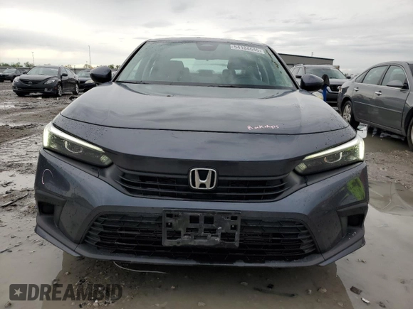 2023 Honda Civic EX z VIN 2HGFE1F78PH308112, wystawiony jako Copart lot #54184645 z przebiegiem 113 024 mil mil oraz Szkoda całkowita • Salvage title. Historia ofert i sprzedaży dostępna na DreamBid. Obrazek 5.