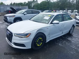 2014 Audi A6 Prestige with VIN WAUHGAFCXEN091050, listed as a IAAI auction lot 42524560 with 169,575 mi miles and . Bid and sale history available at DreamBid. Image 2.