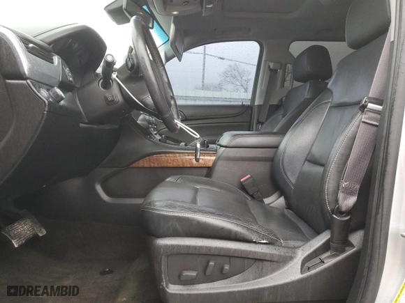2015 Chevrolet Suburban LTZ with VIN 1GNSCKKCXFR587516, listed as a Copart auction lot 50877665 with 193,618 mi miles and Salvage Title. Bid and sale history available at carsss.com. Image 7.