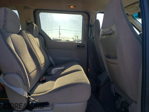 1999 Ford Windstar LX with VIN 2FMZA5140XBB06892, listed as a Copart auction lot 81584994 with 138,550 mi miles and Salvage title. Bid and sale history available at DreamBid. Image 11.