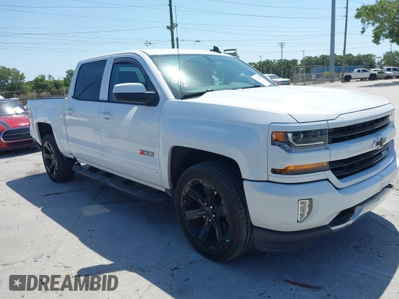 2017 Chevrolet Silverado 1500 LT with VIN 3GCUKREC4HG391101, listed as a IAAI auction lot 42129151 with 84,670 mi miles and . Bid and sale history available at DreamBid. Image 1.