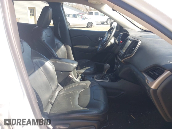 2015 Jeep Cherokee Latitude with VIN 1C4PJMCS8FW624375, listed as a IAAI auction lot 41848679 with 148,130 mi miles and . Bid and sale history available at DreamBid. Image 5.