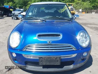2006 MINI Hardtop S z VIN WMWRE33576TN29015, wystawiony jako IAAI lot #42362228 z przebiegiem 74 682 mil mil oraz . Historia ofert i sprzedaży dostępna na DreamBid. Obrazek 6.