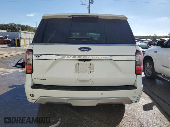 2020 Ford Expedition Platinum with VIN 1FMJU1LT3LEA26650, listed as a Copart auction lot 77768094 with 52,033 mi miles and Salvage title. Bid and sale history available at DreamBid. Image 6.