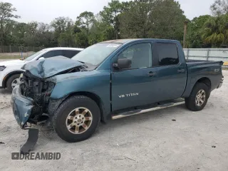 2006 Nissan Titan LE z VIN 1N6BA07B16N557411, wystawiony jako Copart lot #86058634 z przebiegiem 263 198 mil mil oraz Szkody całkowita. Historia ofert i sprzedaży dostępna na DreamBid. Obrazek 1.